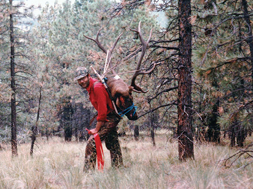 Miles with the first elk he ever harvested with a muzzleloader.